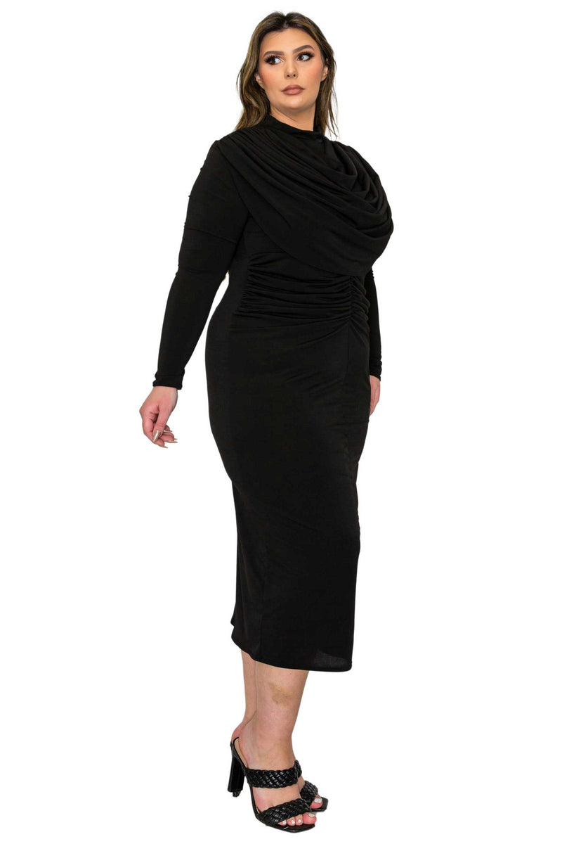 black plus size bodycon midi dress. ruched bodice. side view