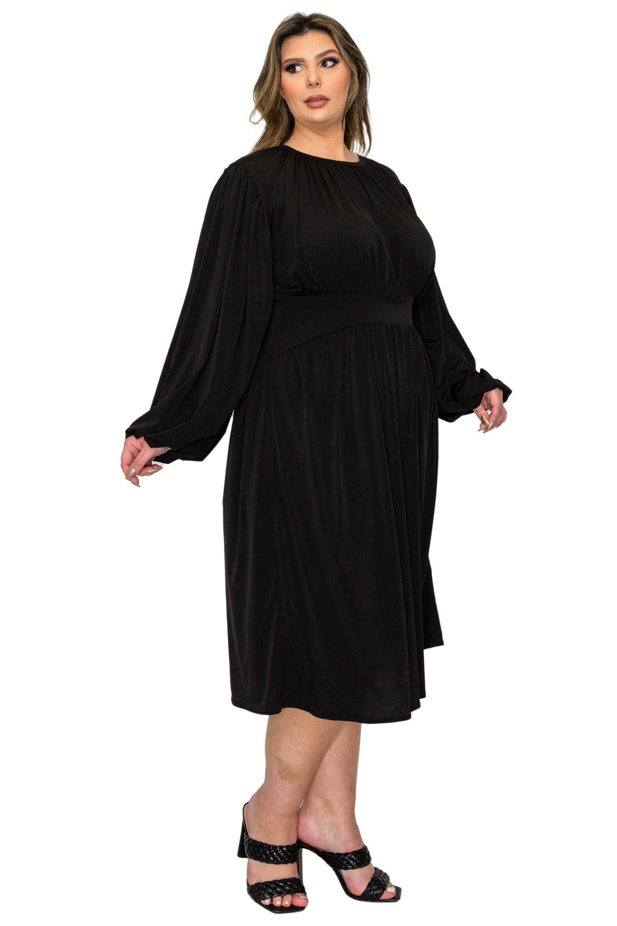 black plus size midi dress, ruched details. side view