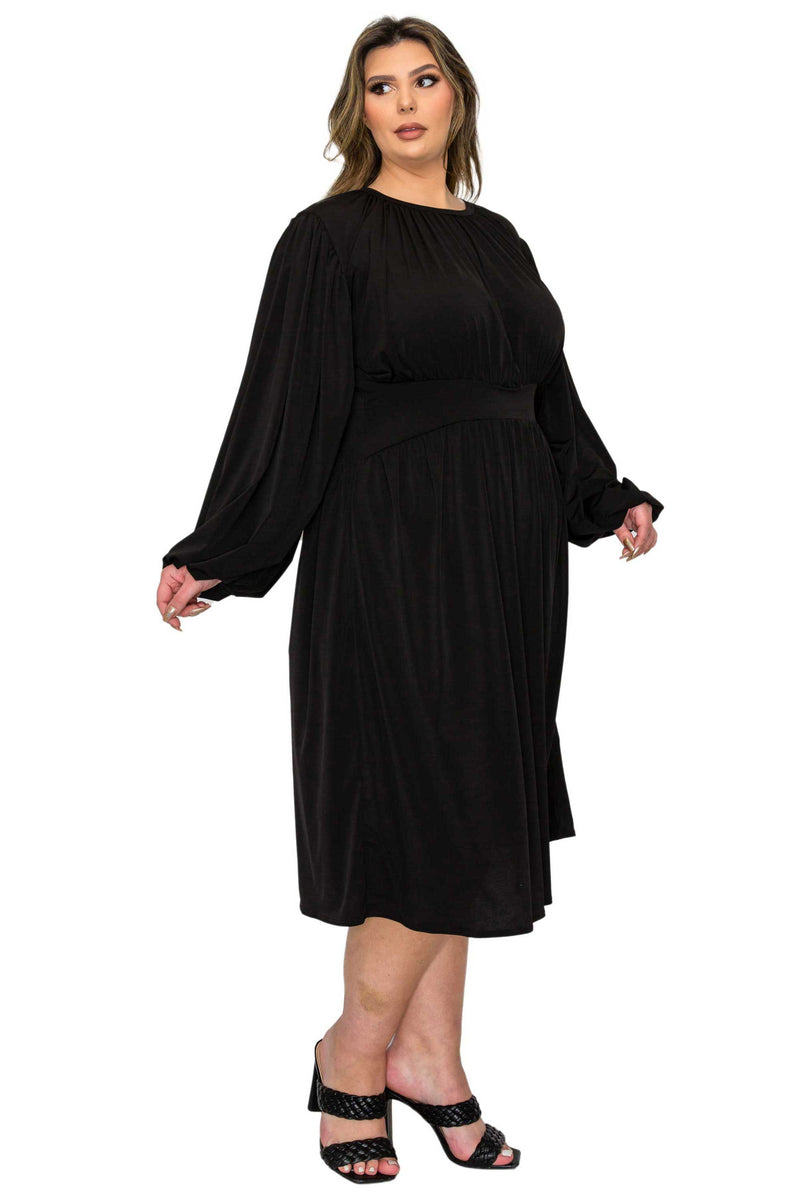 black plus size midi dress, ruched details. side view