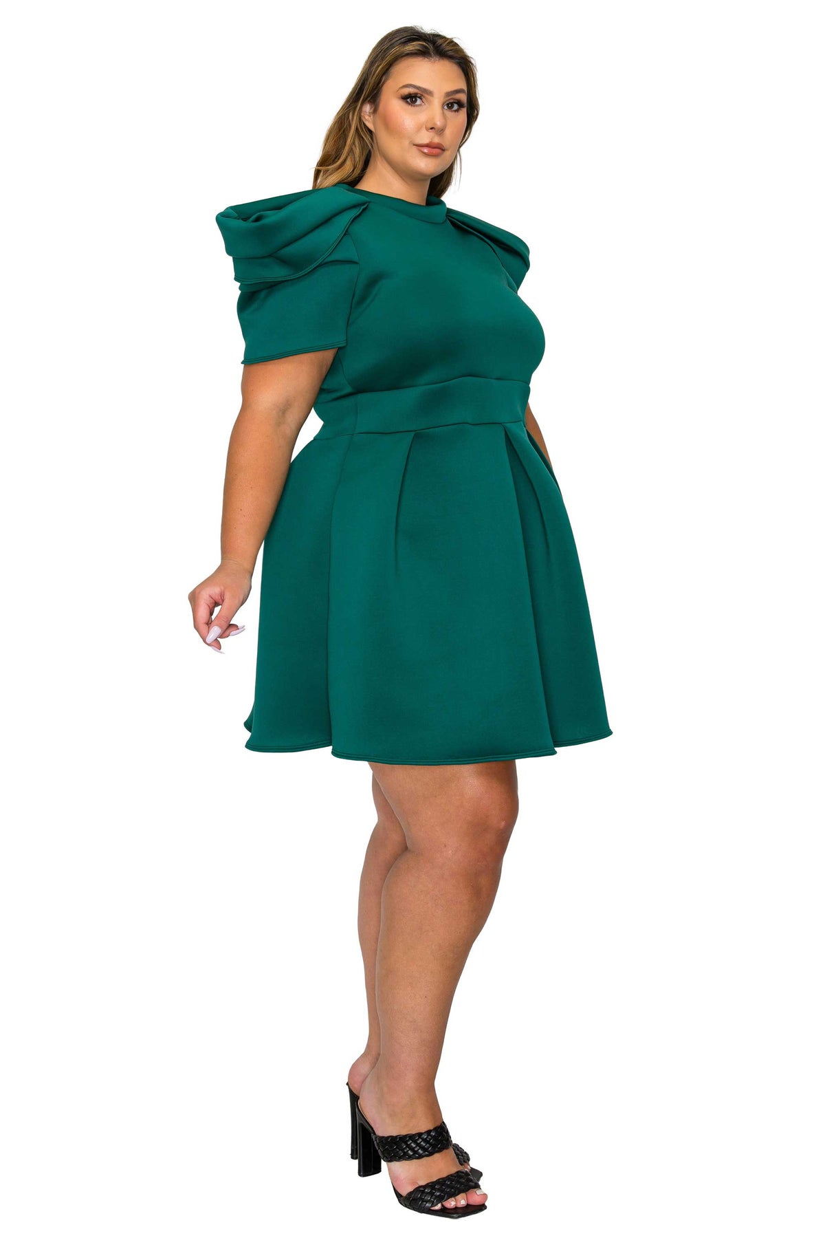 green color plus size neoprene party dress, statement shoulder, short flare hem. side view
