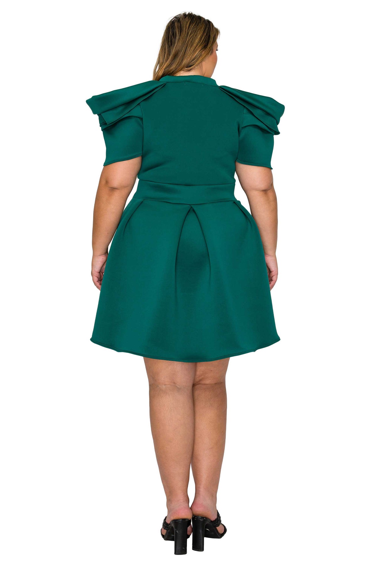 green color plus size neoprene party dress, statement shoulder, short flare hem. back view