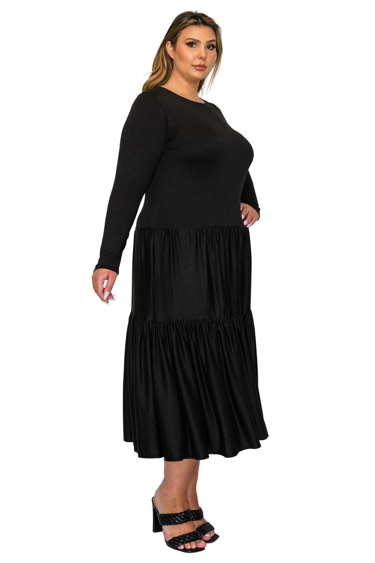 black color a line dress with short sleeves and double tiered hem midi length, side view