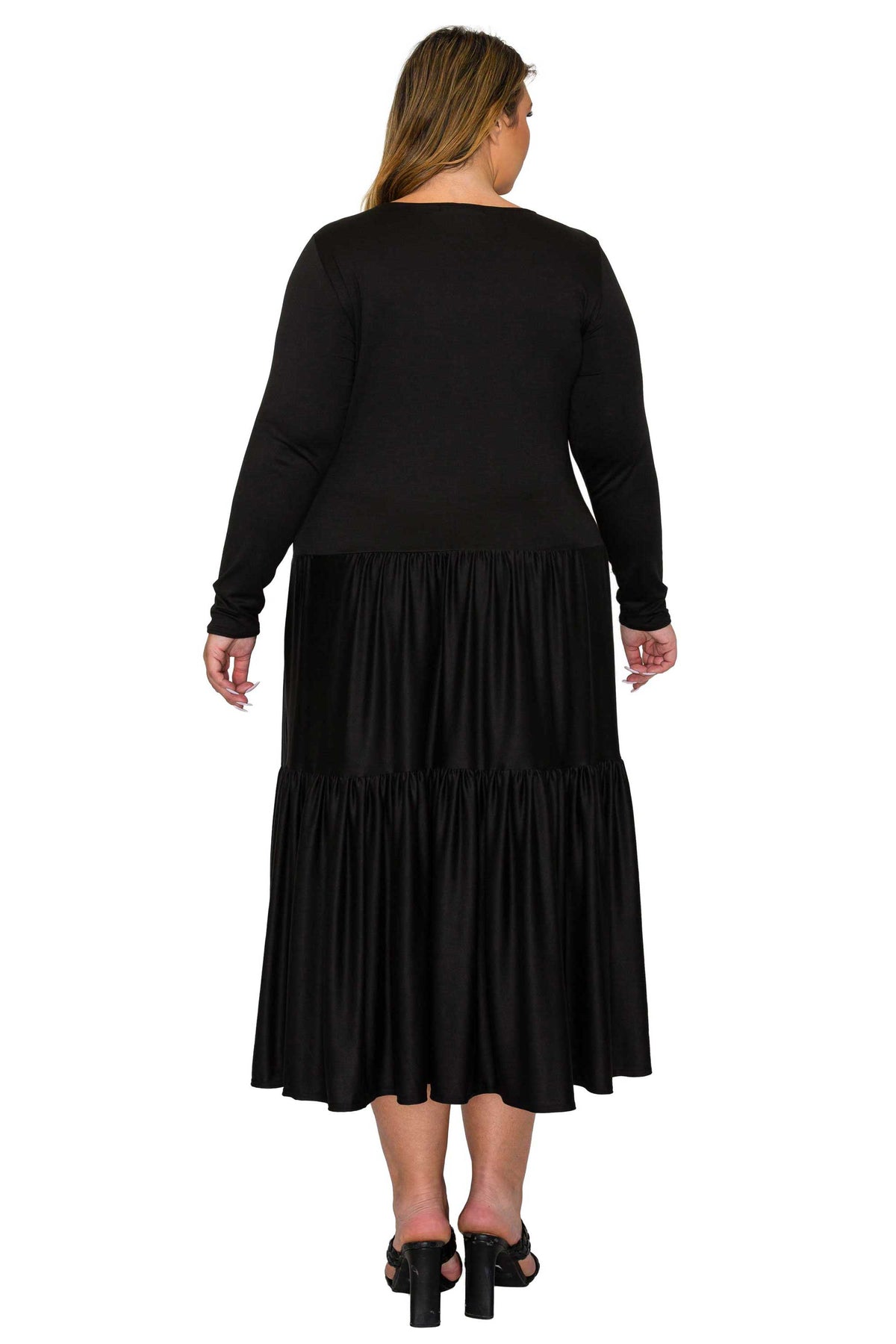 black color a line dress with short sleeves and double tiered hem midi length, back view