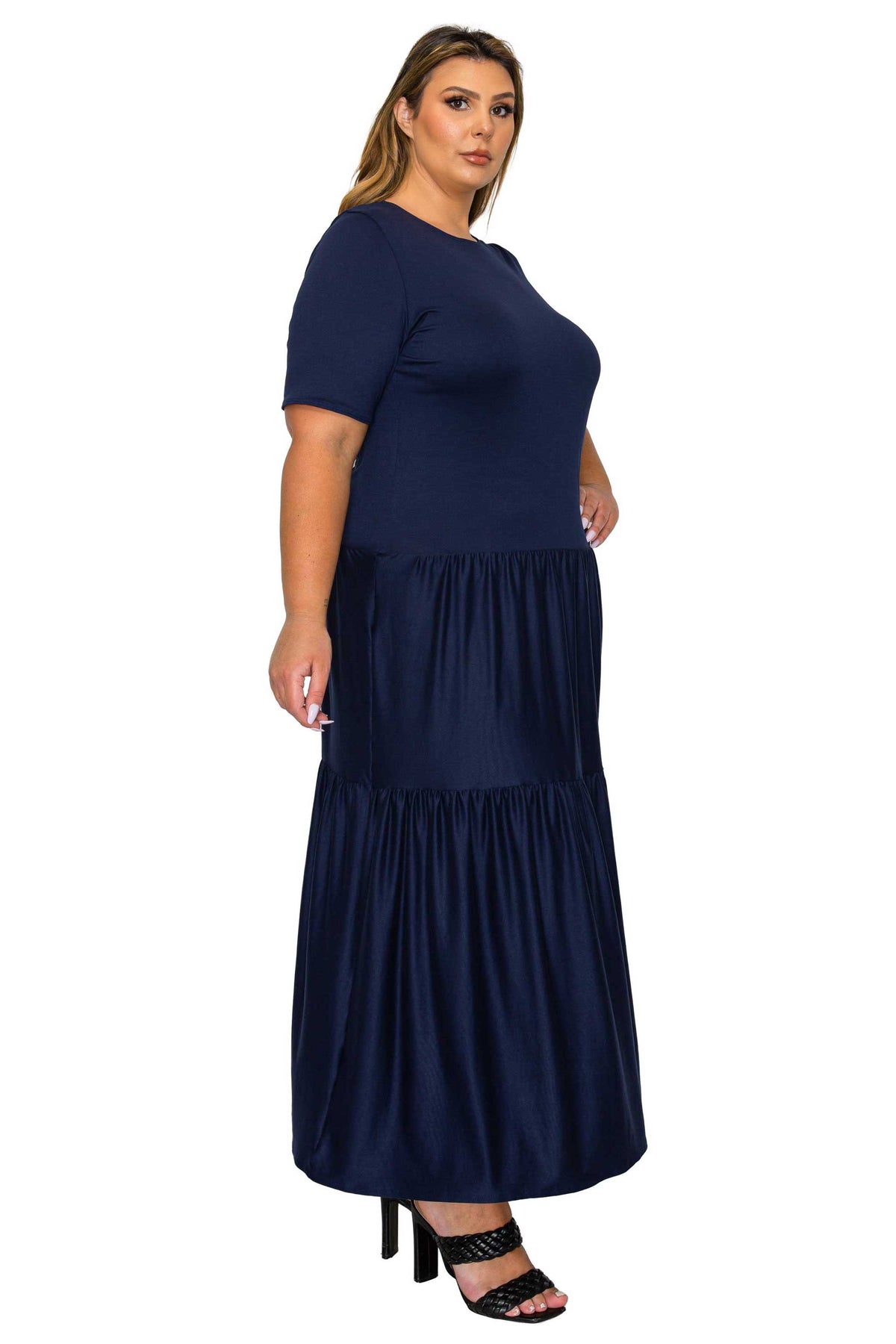 navy color a line dress with short sleeves and double tiered hem, side view