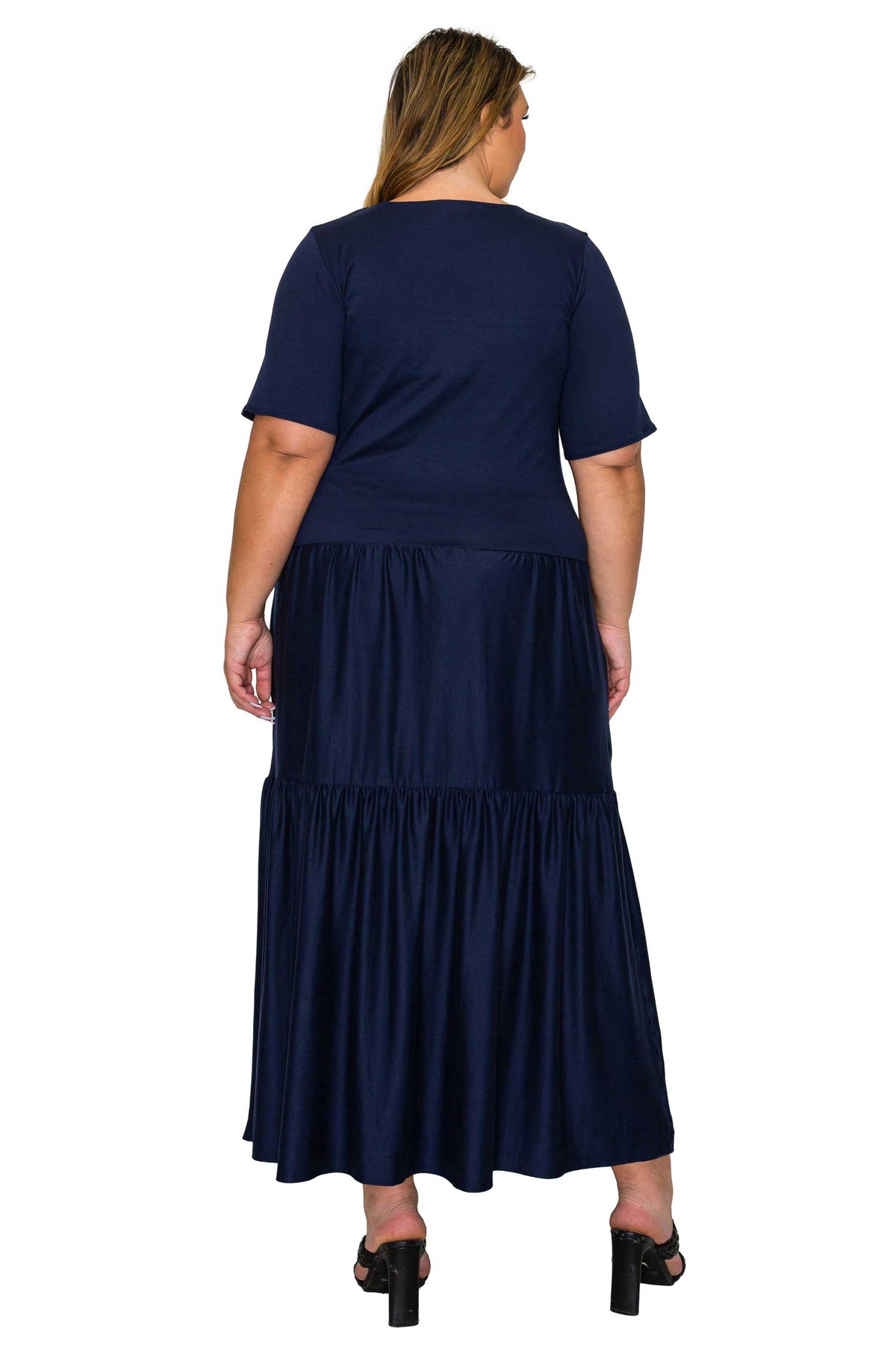 navy color a line dress with short sleeves and double tiered hem, back view