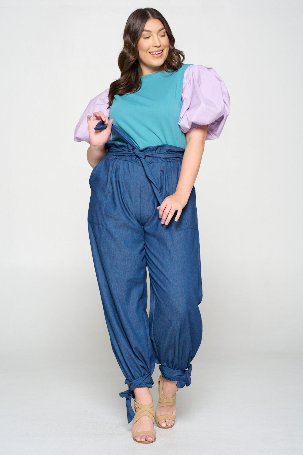 livd apparel plus size boutique contemporary paperbag denim pants with waist tie and leg cuff ribbons in navy denim