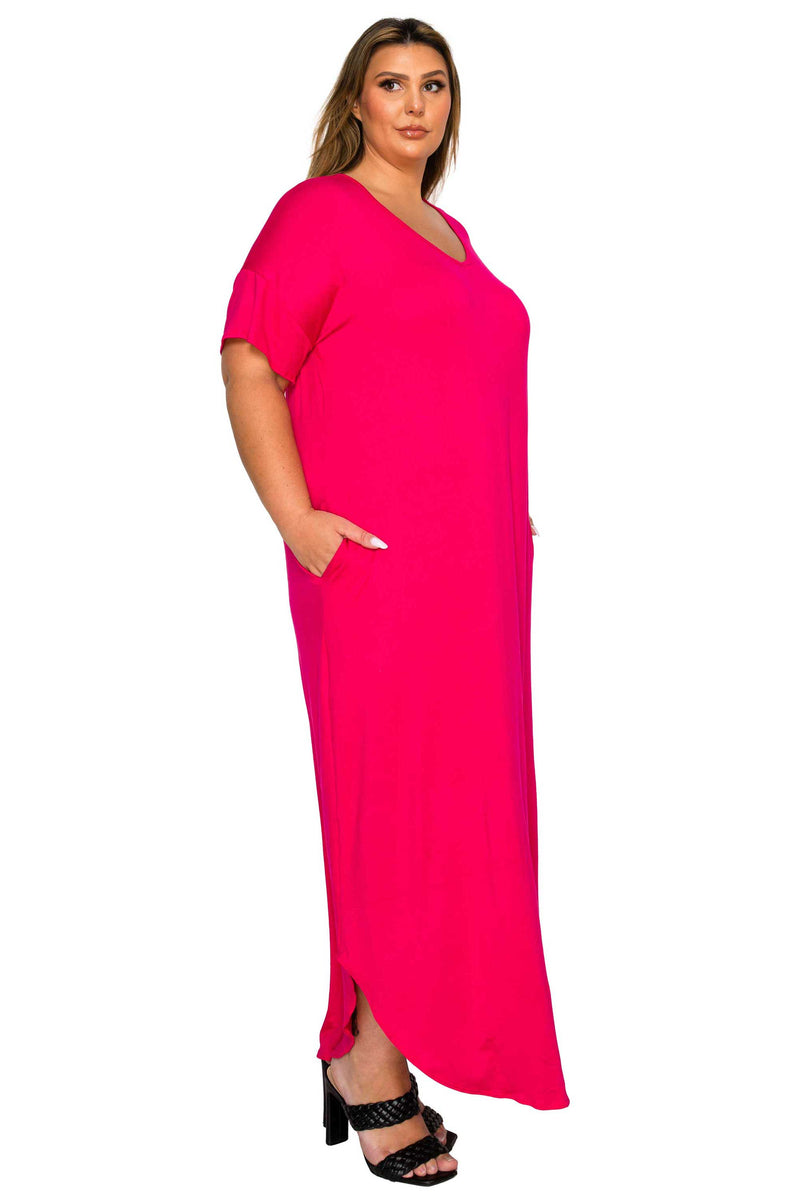 pink color plus size dress, casual short sleeves maxi length dolphin hem with pockets on plus size model. side view